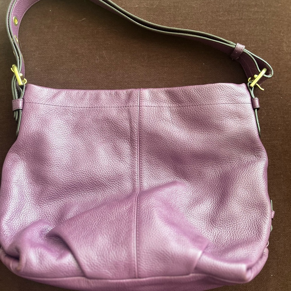 Authentic Coach shoulder bag with gold accents